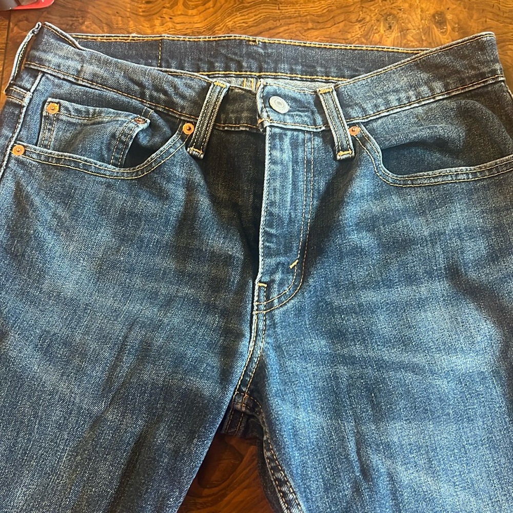Levis 511. 31x32. Frayed hem.